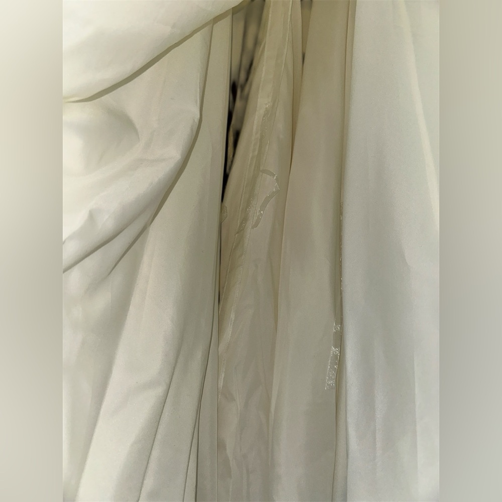 Elegant Ivory Long Sleeve Illusion Wedding Dress with Timeless Charm - Picture 8 of 11